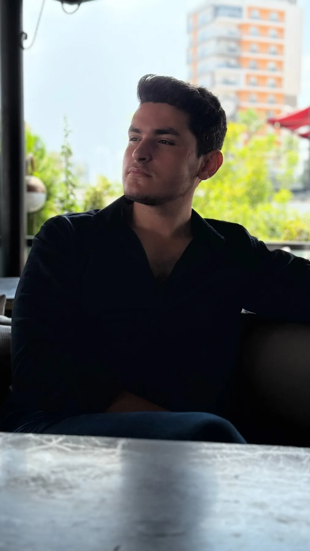Founder portrait in a cafe